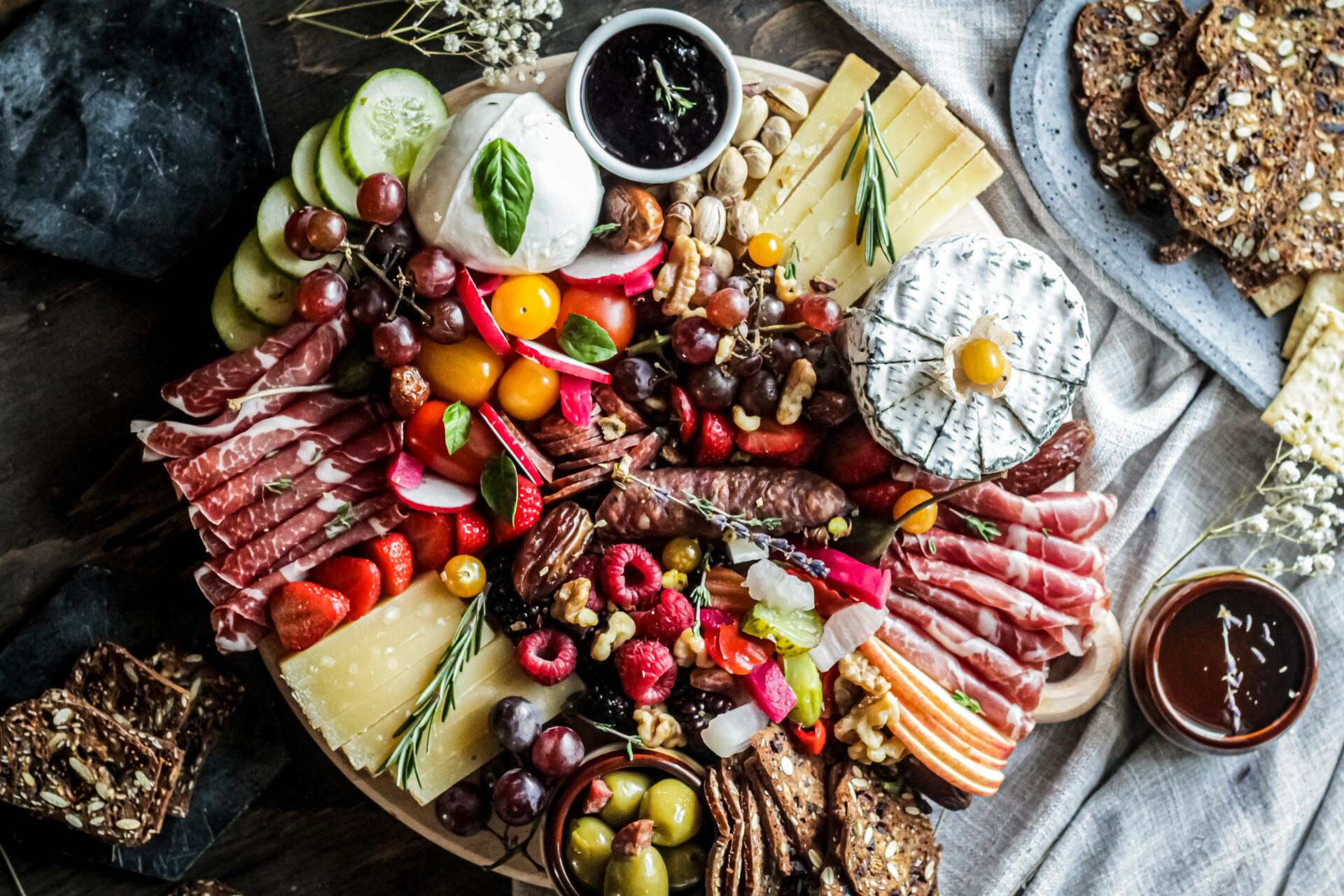 Charcuterie board with cheese, meats and fruit